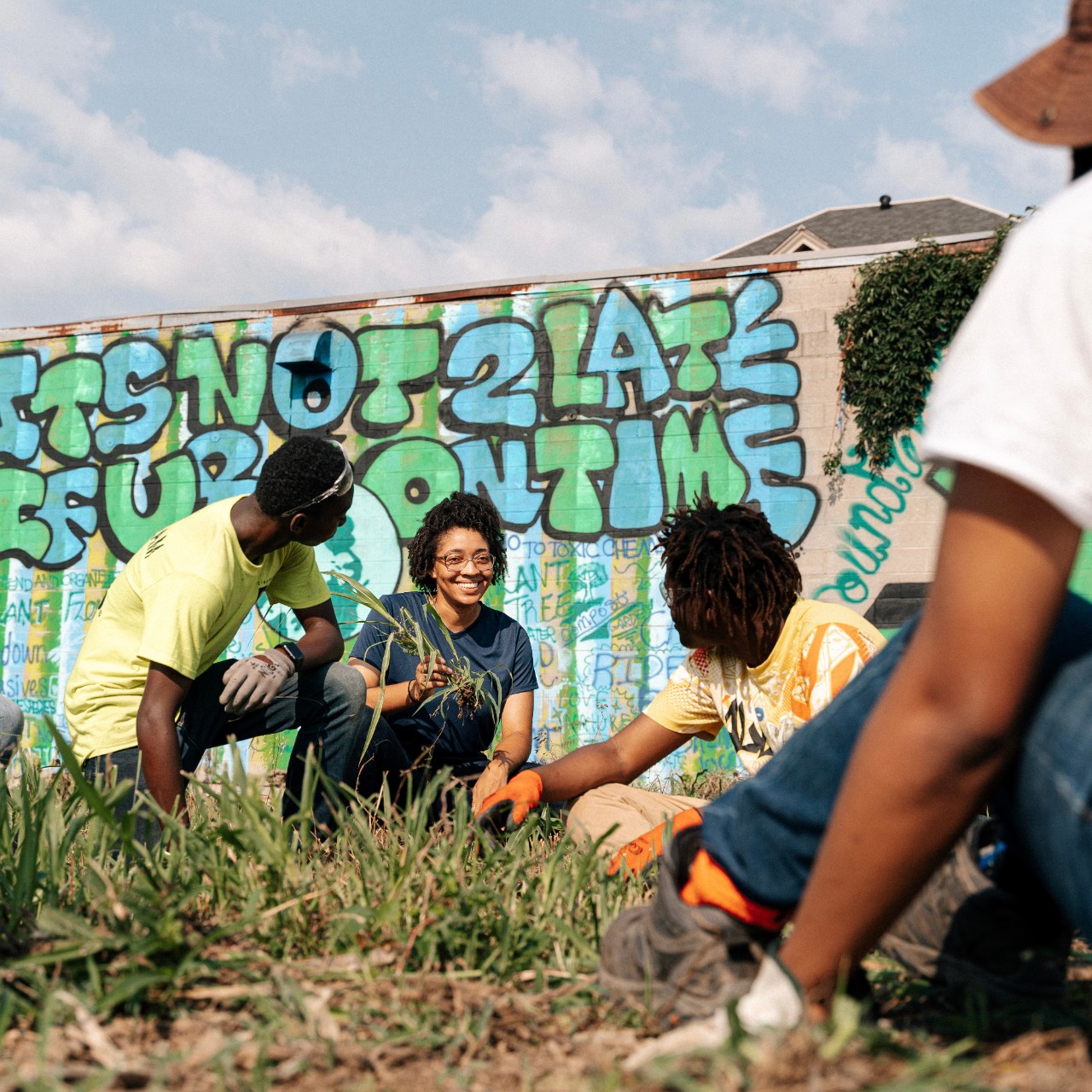 Students planting seeds.