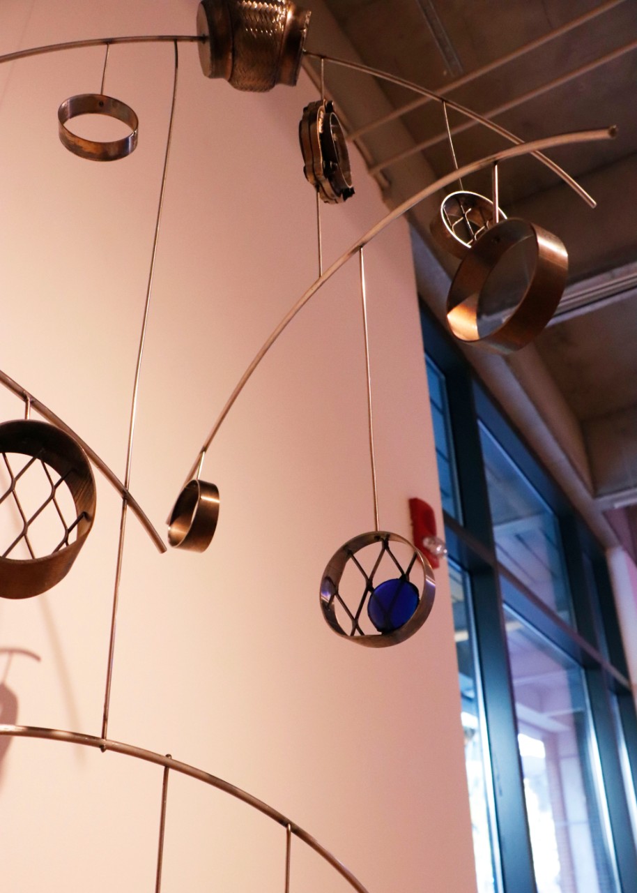 Death of the Combustion Engine by Karen Connolly, Stainless steel, fused glass, turbo exhaust, and mild steel, 2021